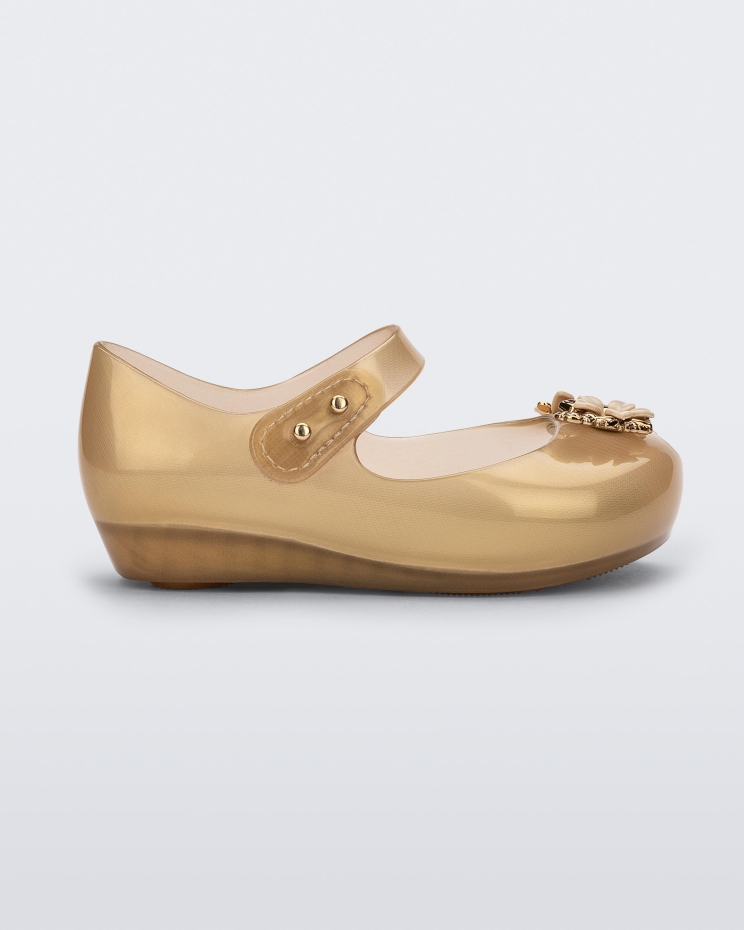 melissa_fashion_mini_ultragirl_chrome_flower_baby_gold.jpg Melissa Fashion Mini Ultragirl Chrome Flower Baby Gold - Image 1